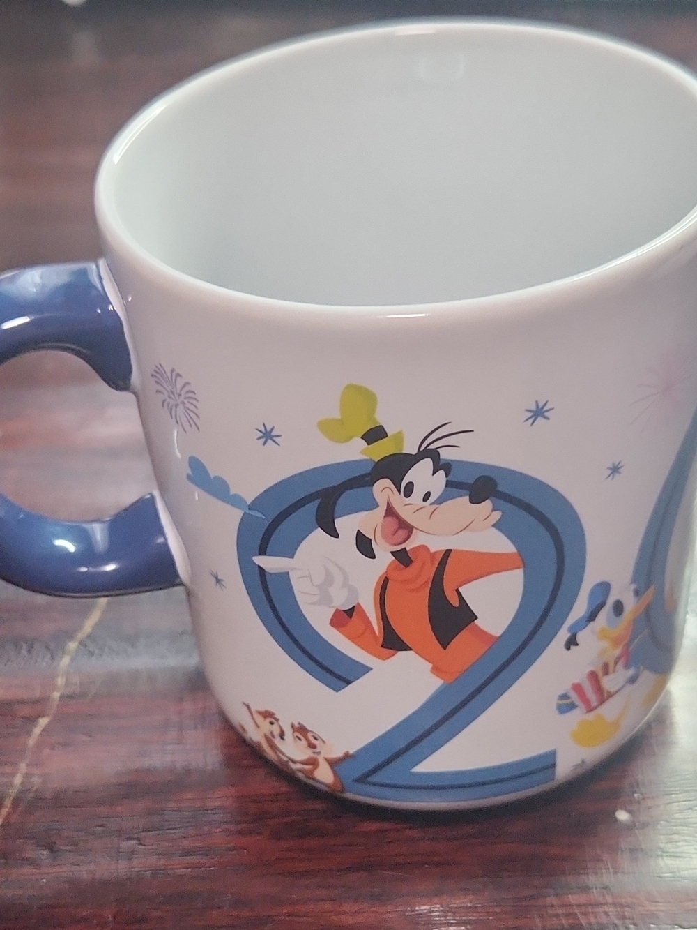 Disney White Mug with Blue Handle and Goofy Artwork